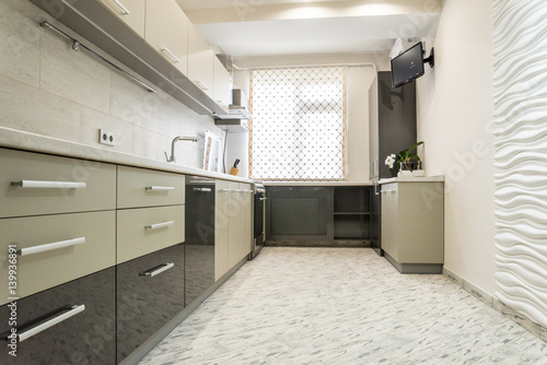 Modern creamy white kitchen clean interior design