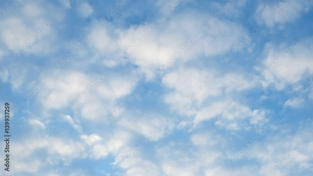 Time lapse clip of white fluffy clouds over blue sky. Beautiful cloudscape Time lapse clip of white fluffy clouds over blue sky. Beautiful cloudscape