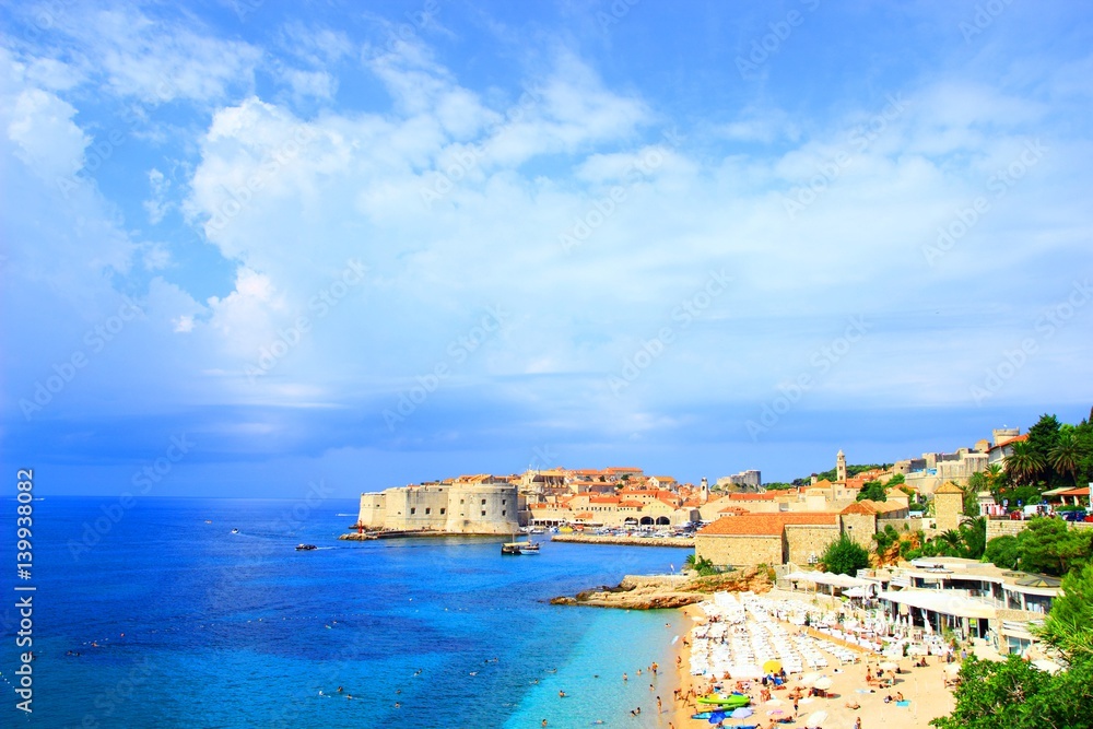 Dubrovnik panoramic view with tourists on the beach Banje, Croatia