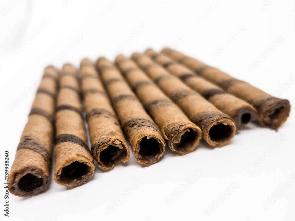 Isolated - Chocolate Wafer Roll on white background, shallow depth of field Isolated - Chocolate Wafer Roll on white background, shallow depth of field