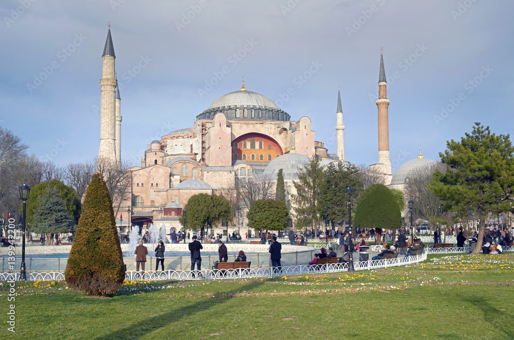 Tourists at the Sophia Mosque and park in Istanbul.