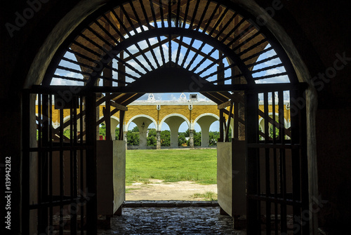 door of entry to the convent of San Antonio of Padua of the city of Izamal in Yucatan, Mexico photo