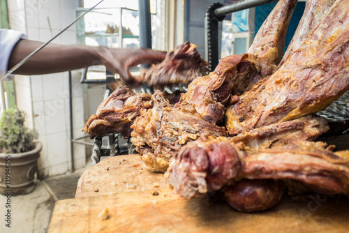 Nyama choma means grilled meat - traditional east african food photo