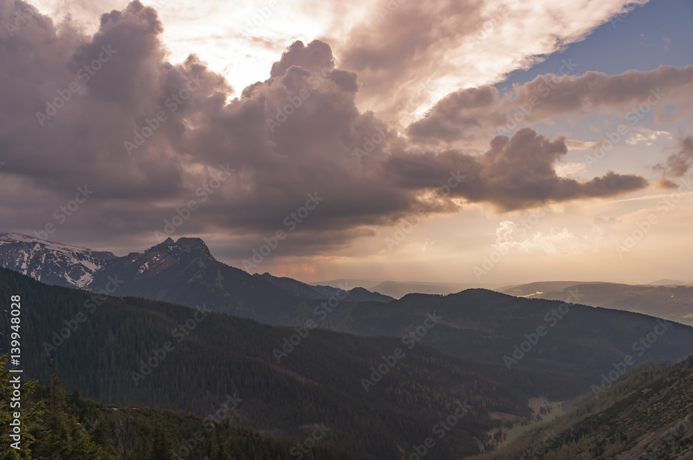 Big storm clouds over the mountains in the spring. Tatra mountains.