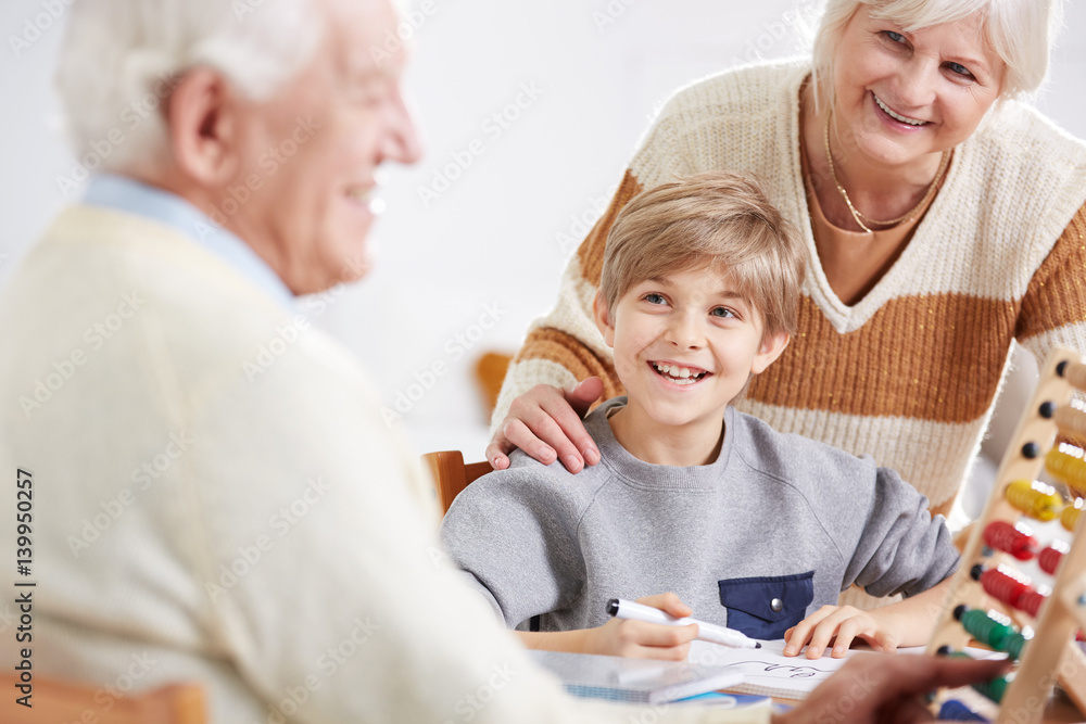 Grandfather teaching his grandson math Grandfather teaching his grandson math