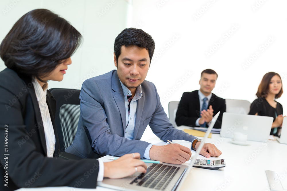 Business people working in conference room Business people working in conference room