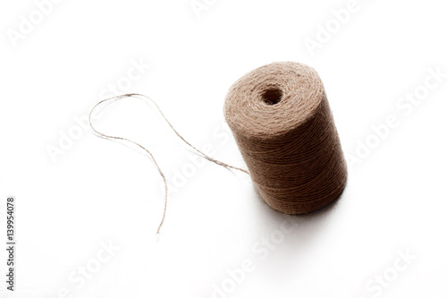 Skein of jute twine isolated on white background