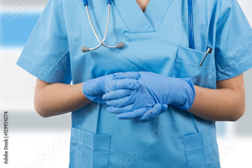 Doctor hands in medical gloves closeup