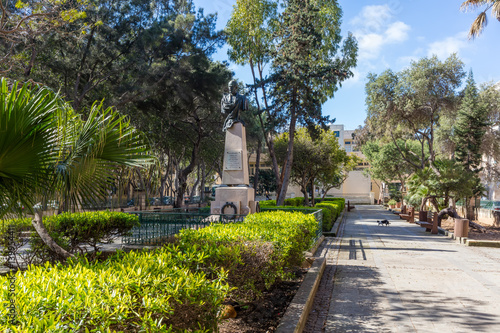 Malta Valletta Floriana: The Mall Gardens - green Malta - parc, garden, trees, leisure, sidewalk, walker, sights, hidden, park, parks, street, streets, city, monument photo