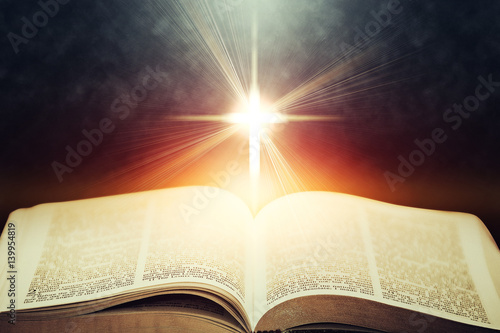 Light flares illuminating the Holy Bible