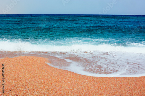 Fototapeta Naklejka Na Ścianę i Meble -  Surf of the sandy beach