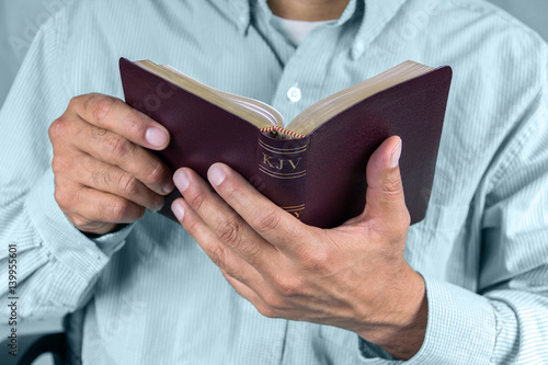 Man reading the Holy Bible