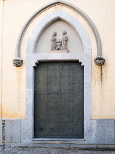 Antique and ornate  wooden door © olga