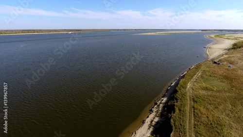 Wallpaper Mural Aerial view of an empty cargo barge floating along the longest river in Europe. Volga. 4K Torontodigital.ca