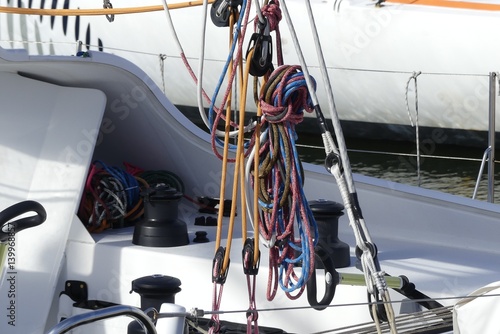 Details of hanging rigging ropes on board Ocean racer sailing boat