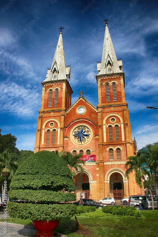Notre-Dame Cathedral Basilica of Saigon in Ho Chi Minh City (Vietnam) against a blue sky