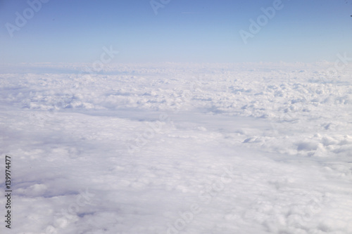 Cumulus couds in sky from 30,000 feet high © Mark J. Barrett