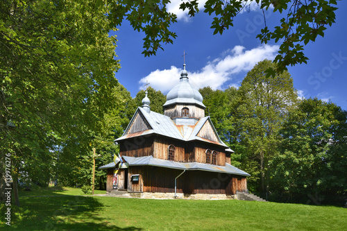 Fototapeta Naklejka Na Ścianę i Meble -  ancient greek catholic wooden church in Chmiel near Ustrzyki Dolne