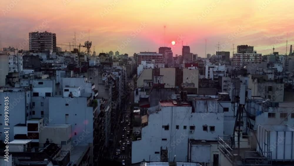 A Red Sun Over Buenos Aires, Capital of Argentina, South America. High Angle View. A Red Sun Over Buenos Aires, Capital of Argentina, South America. High Angle View.