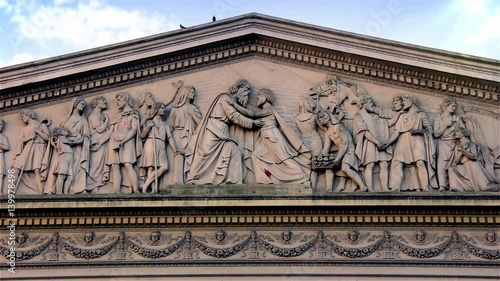 Neoclassical Pediment with Sculpture of the Reunion of Joseph with his Father and Brothers in Egypt by Joseph Dubourdieu at the Buenos Aires Metropolitan Cathedral, in Buenos Aires, Argentina.    photo