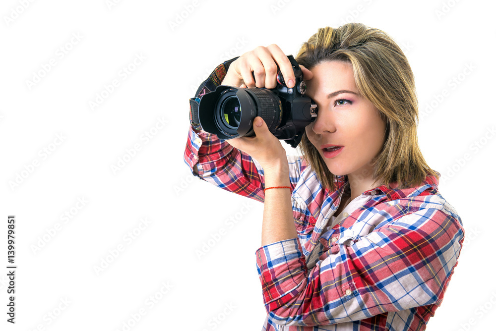 Girl photographer taking picture in the studio, portrait of girl with a camera on white background. Space for text
Girl photographer taking picture in the studio, portrait of girl with a camera on white background. Space for text
