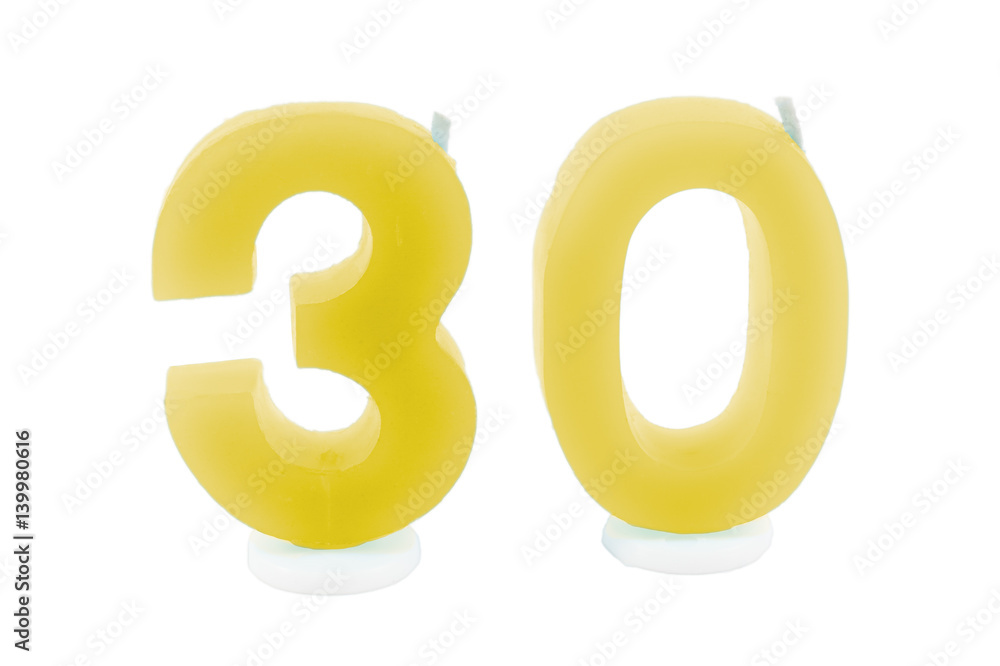 Yellow candles in the form of 30th birthday