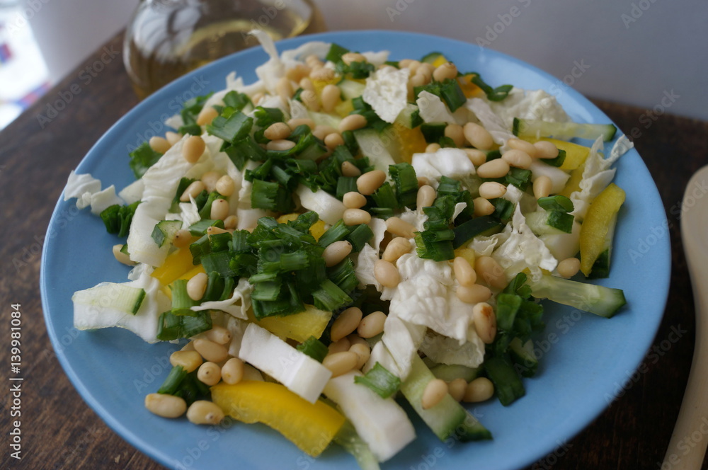 Organic, vegetarian salad from fresh vegetables with pine nuts Organic, vegetarian salad from fresh vegetables with pine nuts