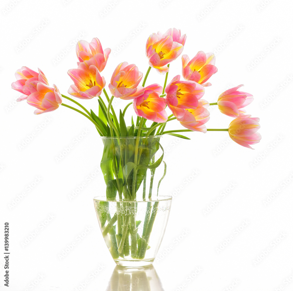 Bright spring bouquet in a vase. Springtime. Vase with tulips. Bright spring bouquet in a vase. Springtime. Vase with tulips.