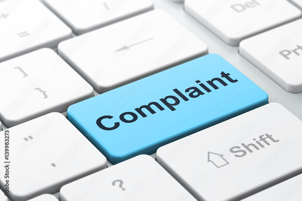 Law concept: Complaint on computer keyboard background Law concept: Complaint on computer keyboard background