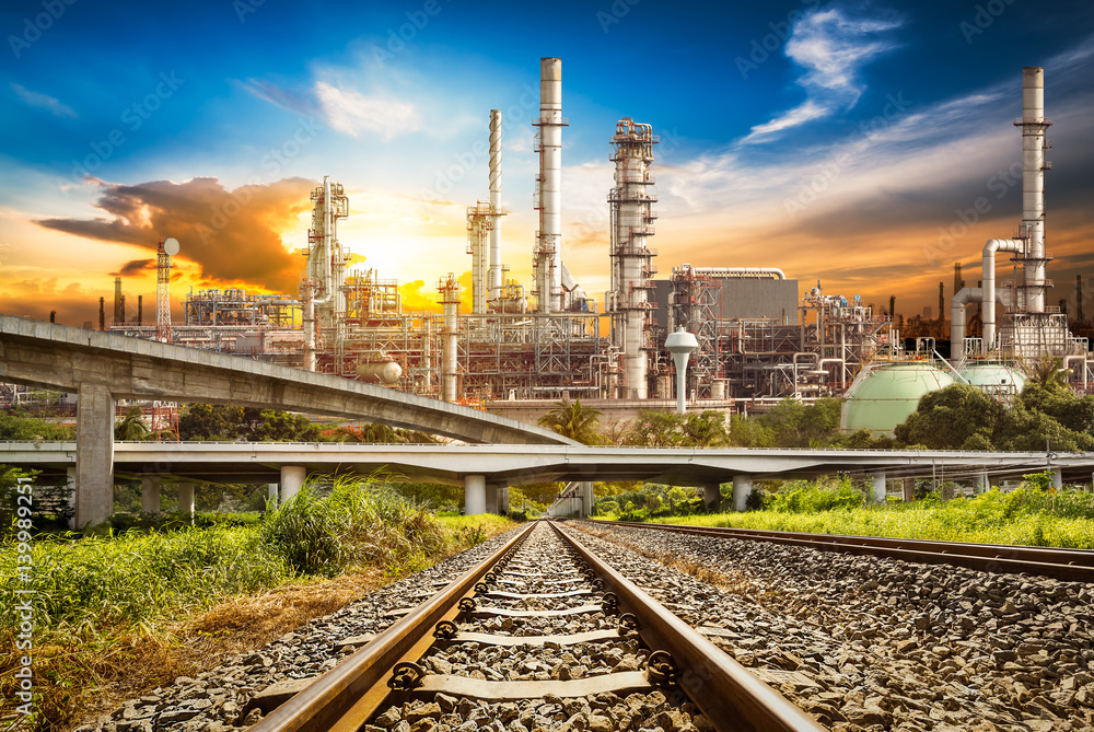 Fototapeta premium Railway and road to refinery