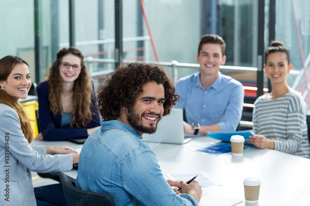 Fototapeta premium Portrait of smiling business team in meeting