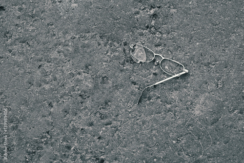 broken glasses on the road © artpodporin