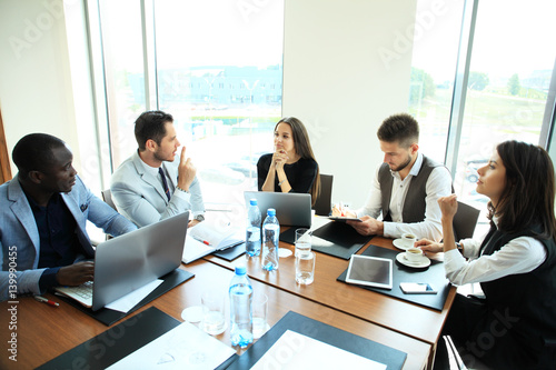 Entrepreneurs and business people conference in modern meeting room.