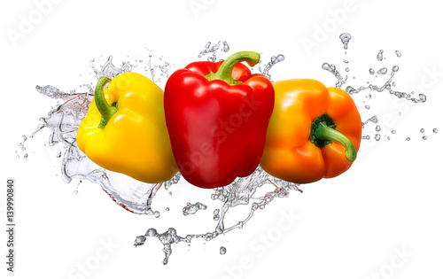 Water splash and vegetables isolated on white backgroud. Fresh bell pepper
