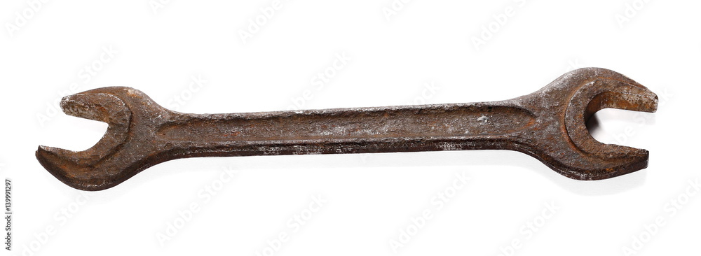 old rusty metal wrench isolated on white