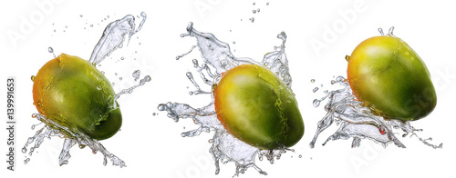 Fototapeta Naklejka Na Ścianę i Meble -  Water splash and fruits isolated on white backgroud. Fresh mango