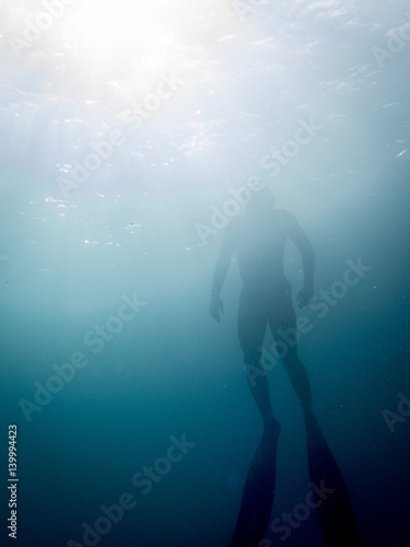 Diver Ascending From The Depths