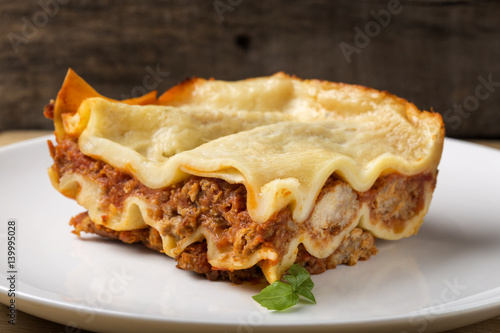 Homemade Italian lasagna bolognese on plate
