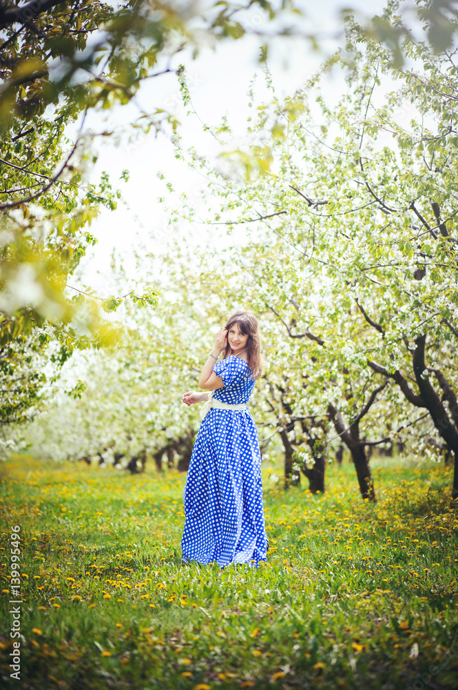 beautiful woman in a cherry orchard beautiful woman in a cherry orchard