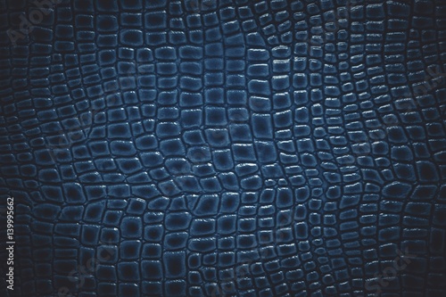 Crocodile leather texture background. Macro shot. Stock image.