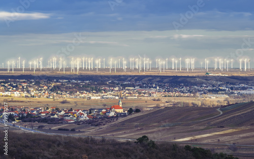 Windpark in Neusiedl am See im Vordergrund die Ortschaft Jois photo