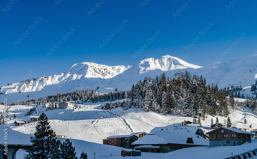 Beautiful winter weather on ski resort in high mountains