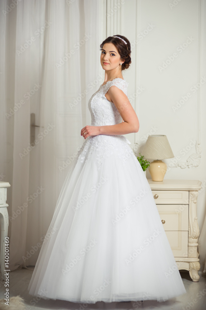 Beautiful bride before wedding ceremony in appartament Beautiful bride before wedding ceremony in appartament