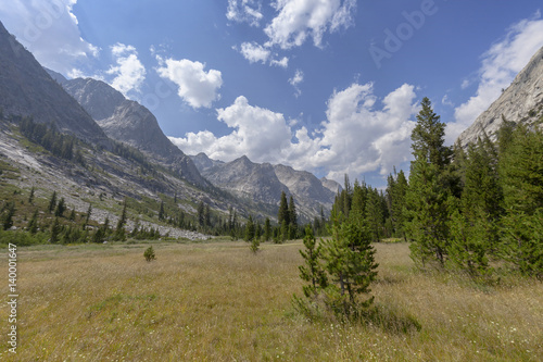 Granite Giants - Large granite monolith mountains rise from a high Sierra mountain valley.