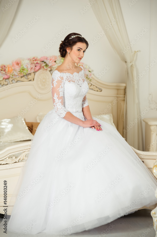 Beautiful bride before wedding ceremony in appartament Beautiful bride before wedding ceremony in appartament
