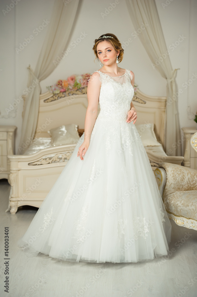 Beautiful bride before wedding ceremony in appartament Beautiful bride before wedding ceremony in appartament