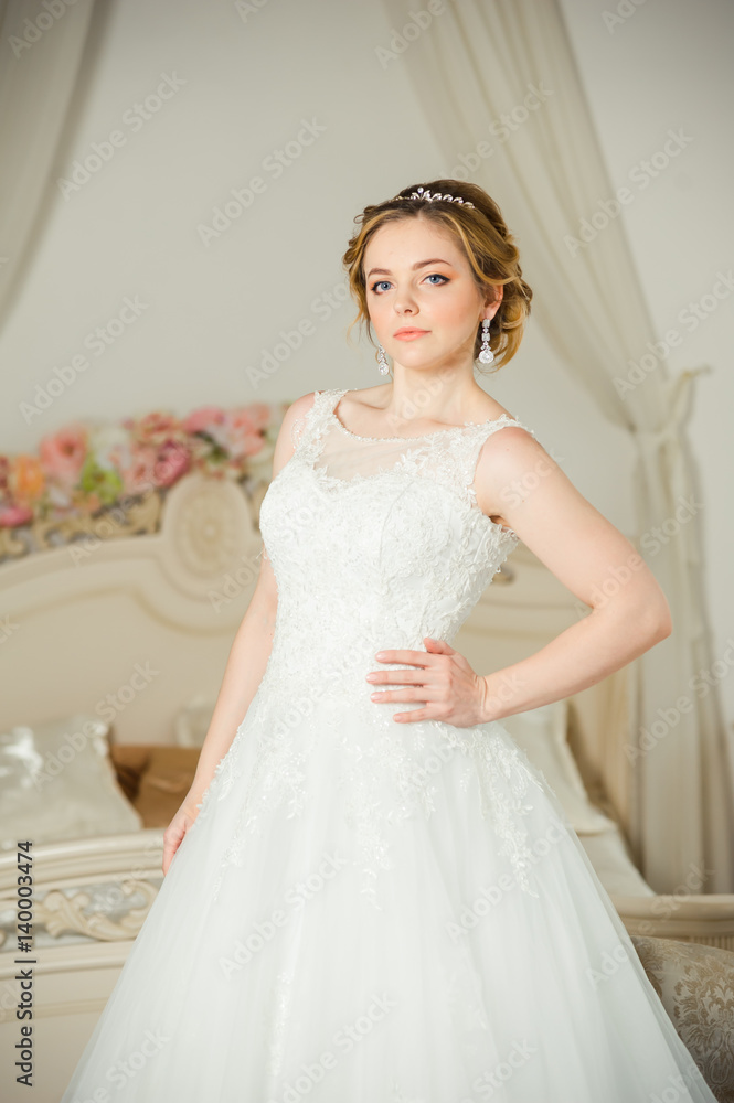 Beautiful bride before wedding ceremony in appartament Beautiful bride before wedding ceremony in appartament
