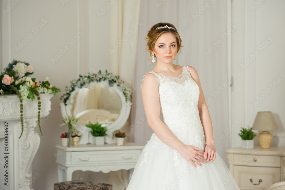 Beautiful bride before wedding ceremony in appartament Beautiful bride before wedding ceremony in appartament