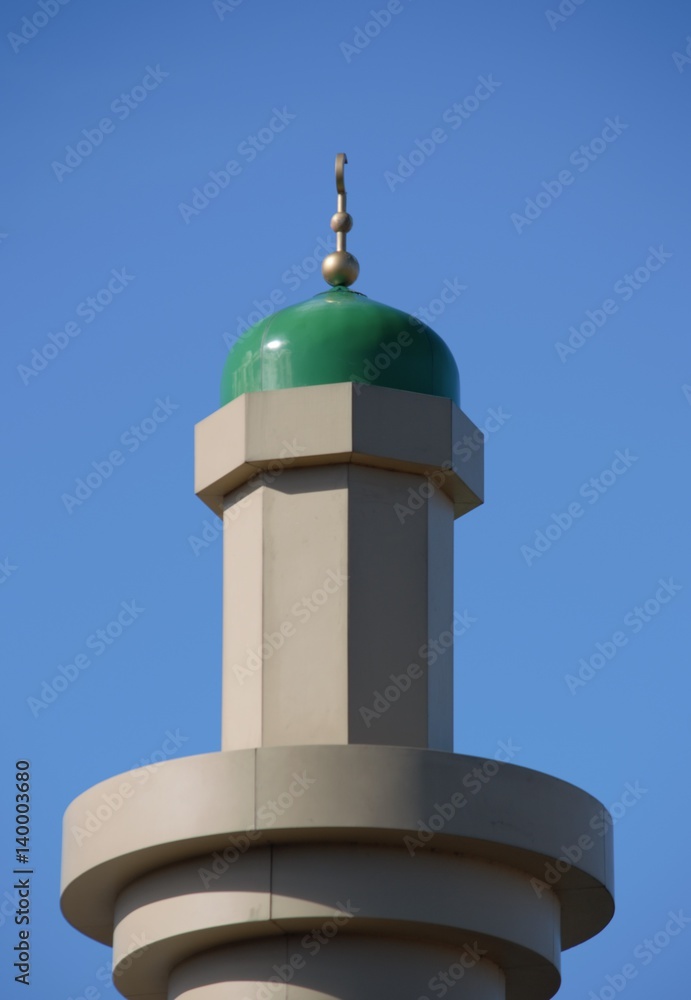 Minaret against solid blue sky Minaret against solid blue sky