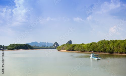 Fishing boat in Bay of Pak Nam Krabi on blue sky, Krabi, Thailand